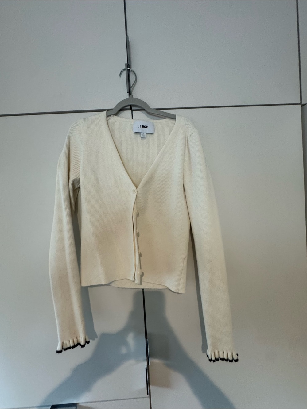 Cream V‑Neck Button Front Cardigan